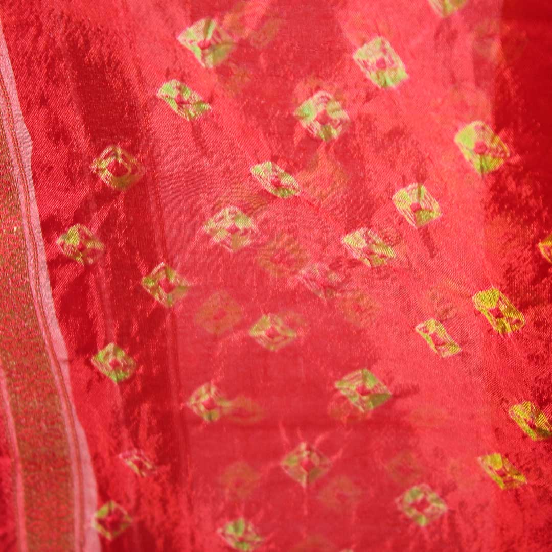 Red Bandhej with yellow block colored traditional wear saree with zari border