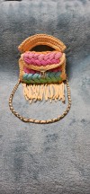 Tasselled rainbow crochet purse